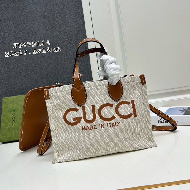 G*u*i shopping bags